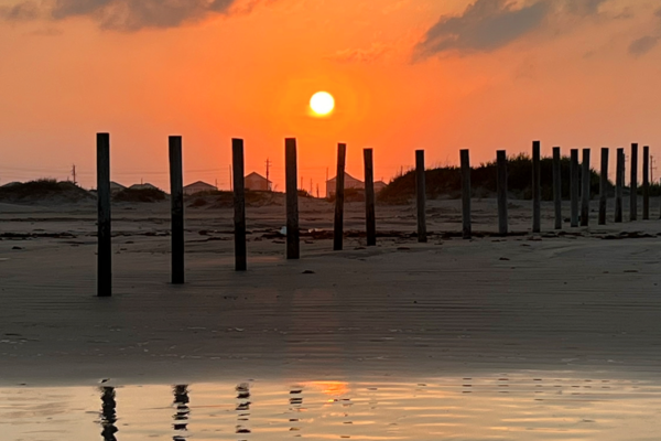 View of the Sunset From the Far Edge of Pointe West Beach
